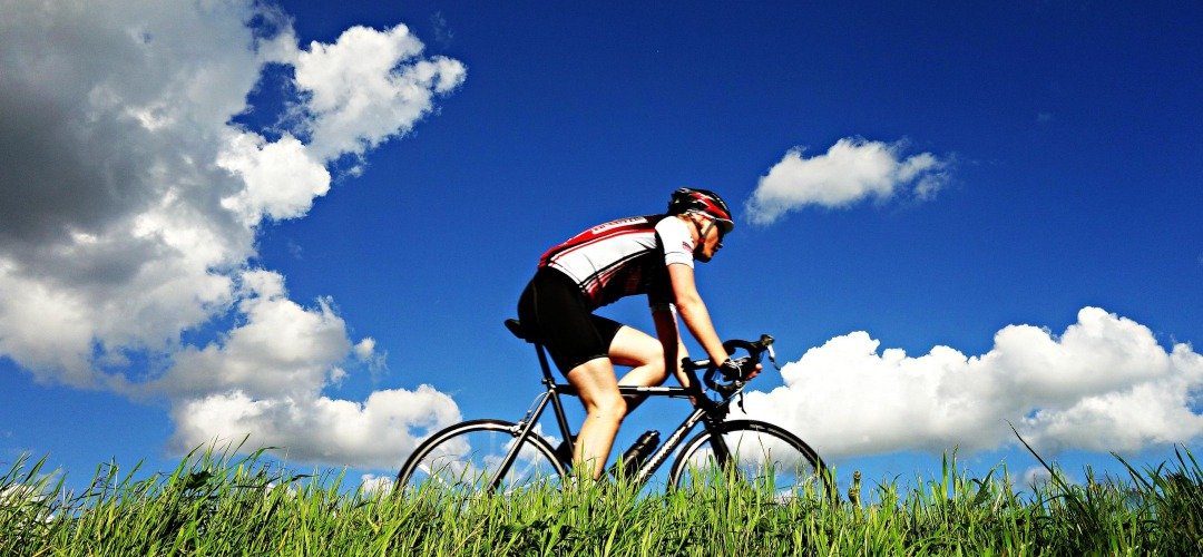 Cyclist in full cycle gears riding a cycle